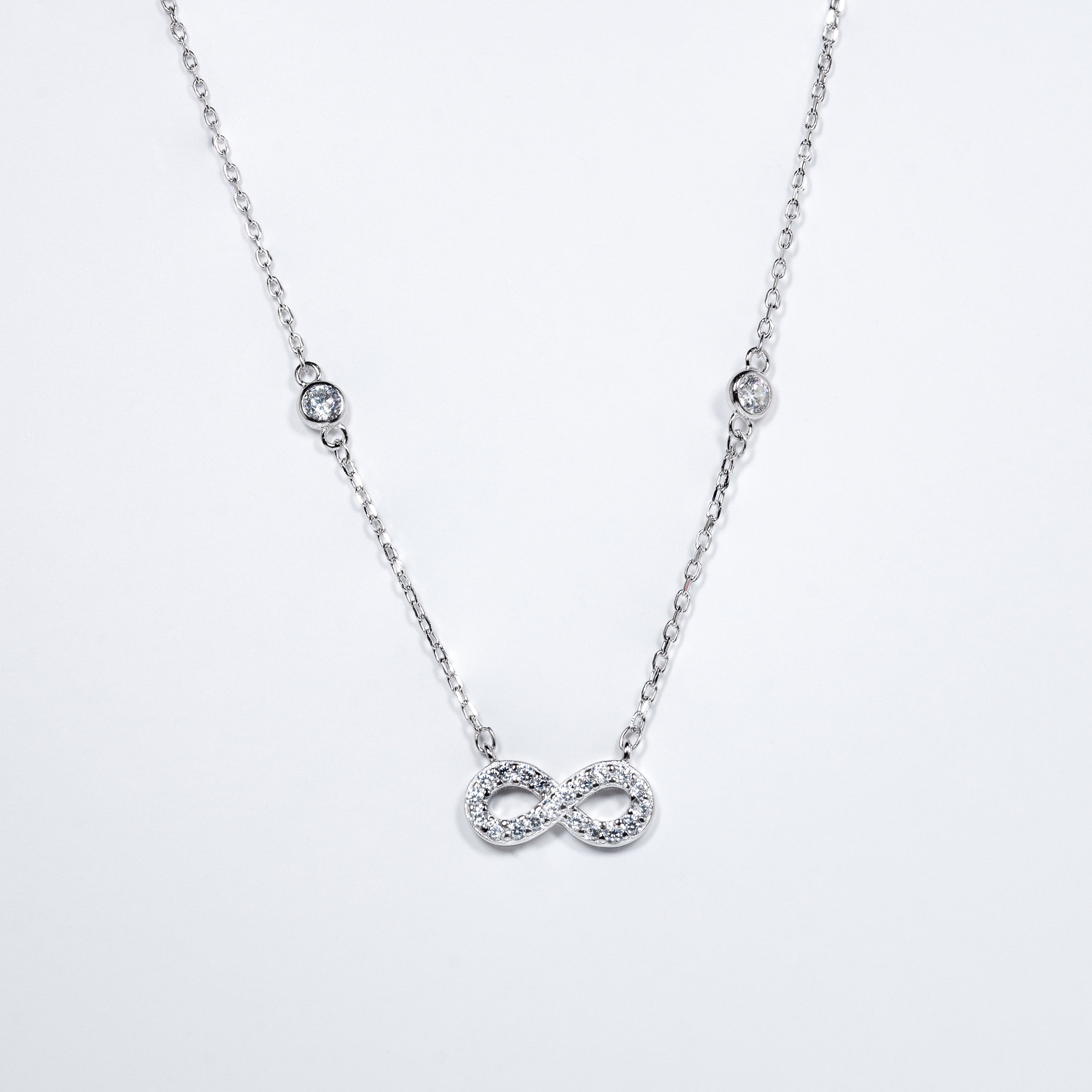 Sparkling Infinity Pendant Necklace in Sterling Silver and Cubic Zirconia
