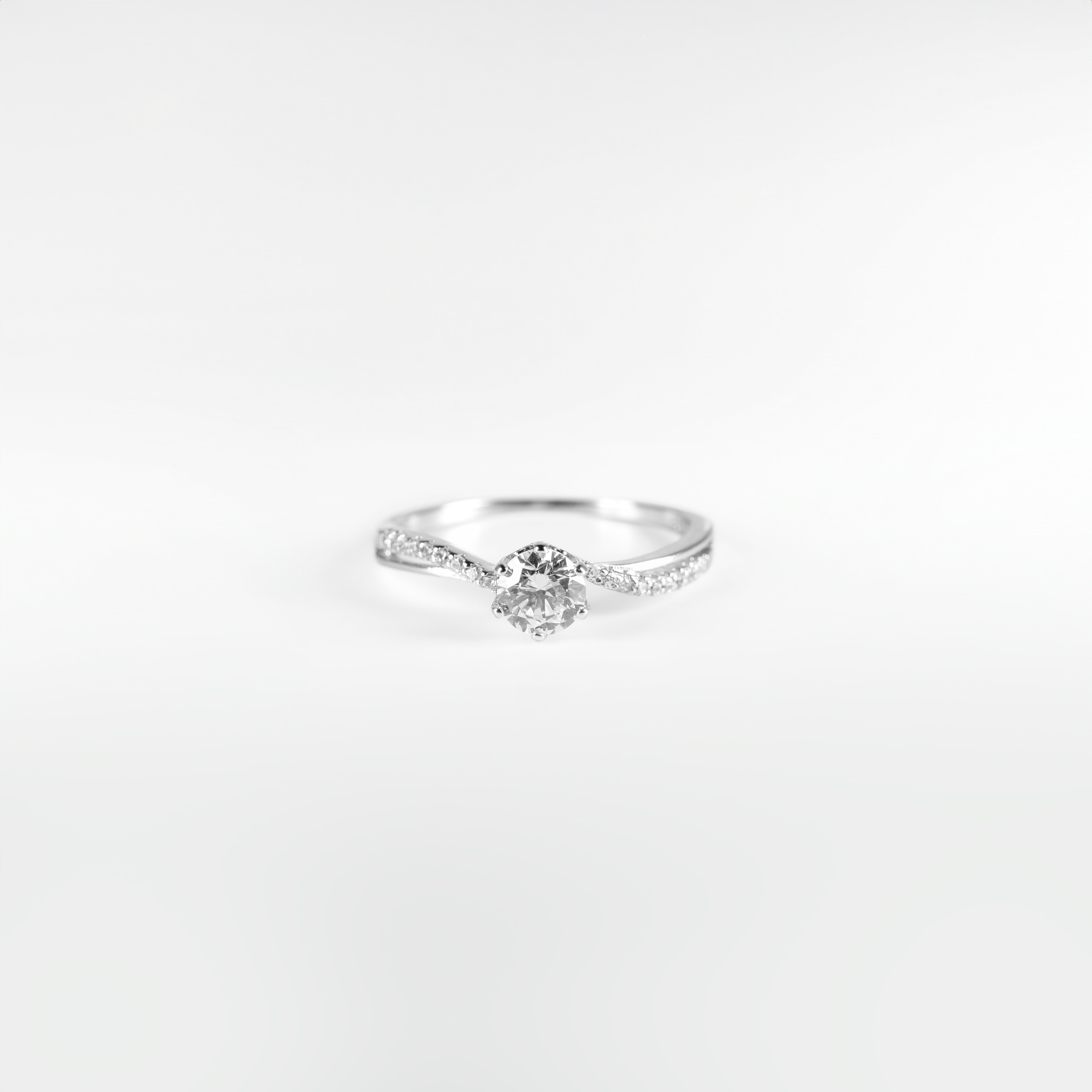 Sparkling Solitaire Engagement Ring in Sterling Silver