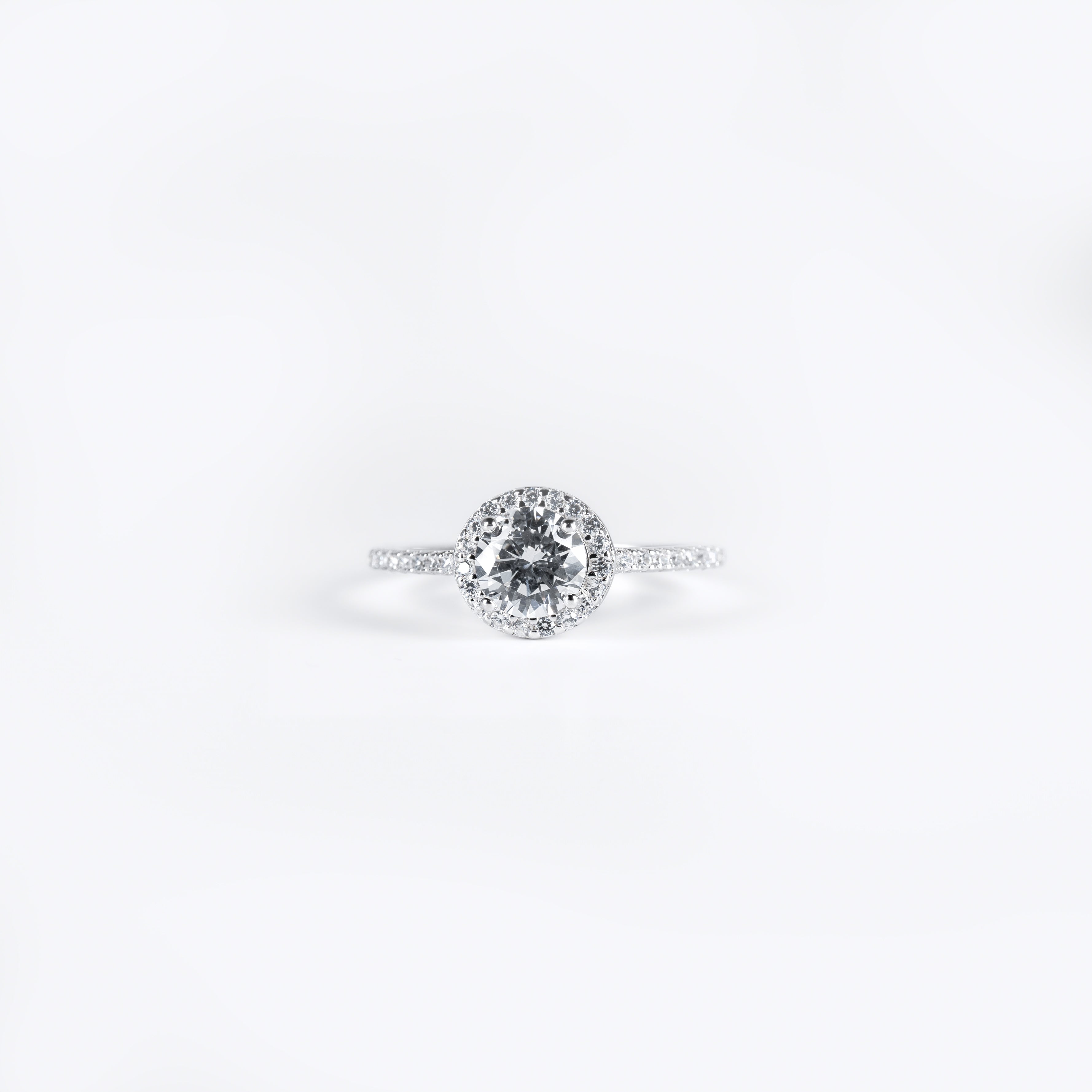 Stunning Halo Engagement Ring in Sterling Silver